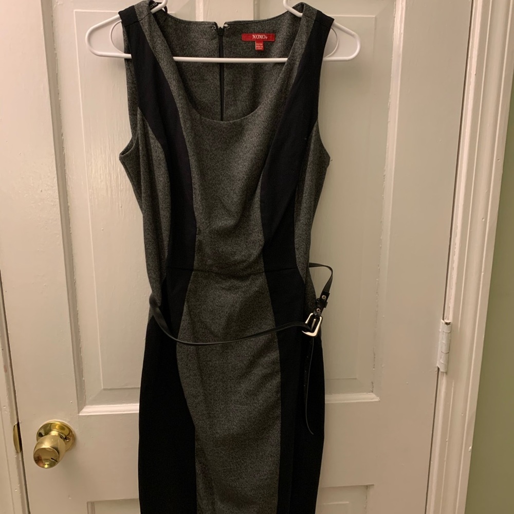 Professional black and gray fitted dress.